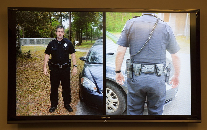 Photos are displayed by the prosecution show the appearance of Michael Slager in April, during bond hearing, in Charleston