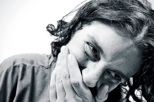 woman-covering-mouth2_1600-971x647